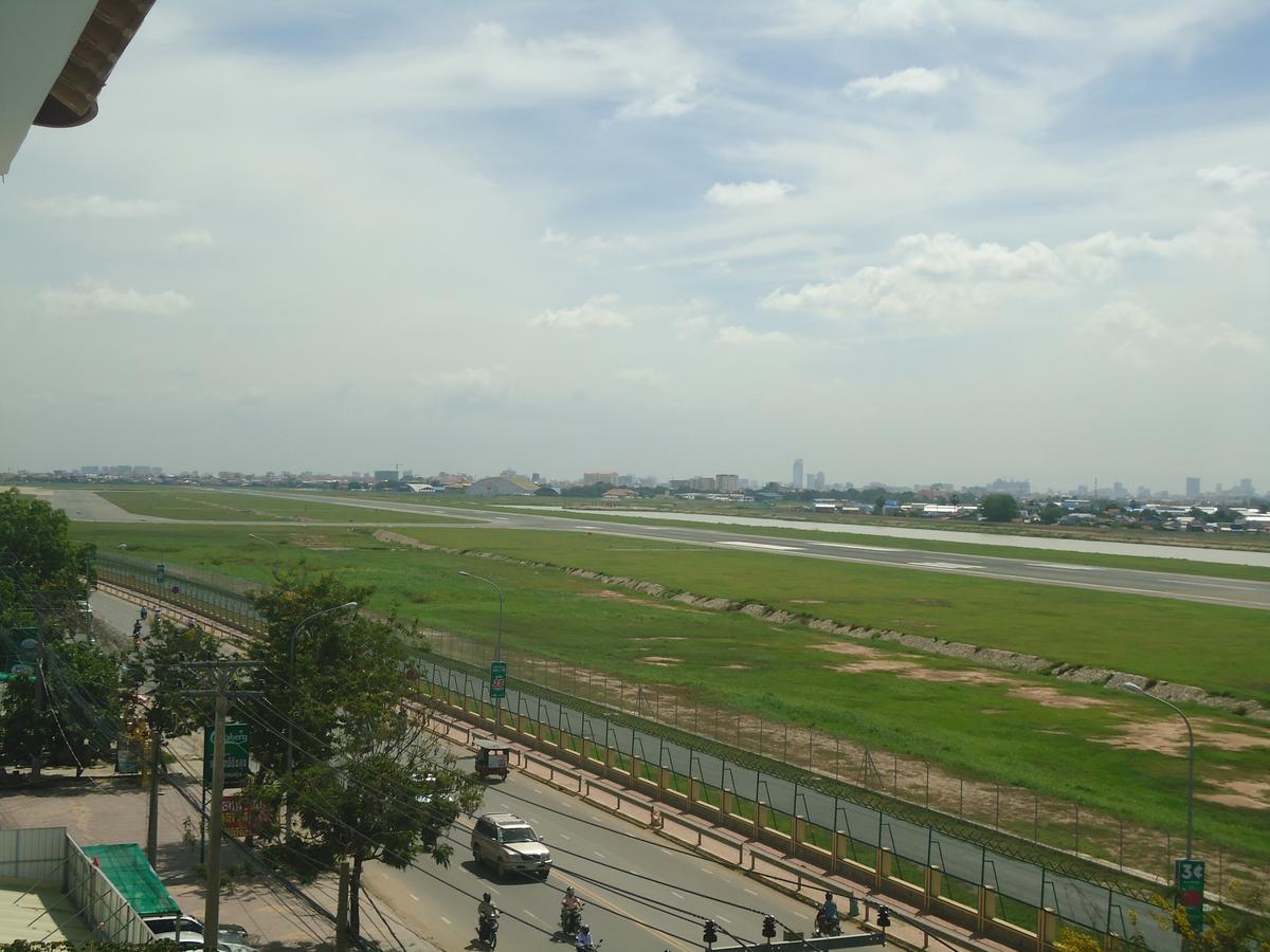 โรงแรมโกลเดน แอปเปิล พนมเปญ ภายนอก รูปภาพ