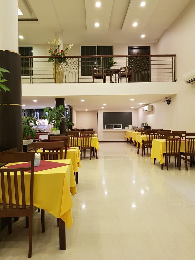 โรงแรมโกลเดน แอปเปิล พนมเปญ ภายนอก รูปภาพ