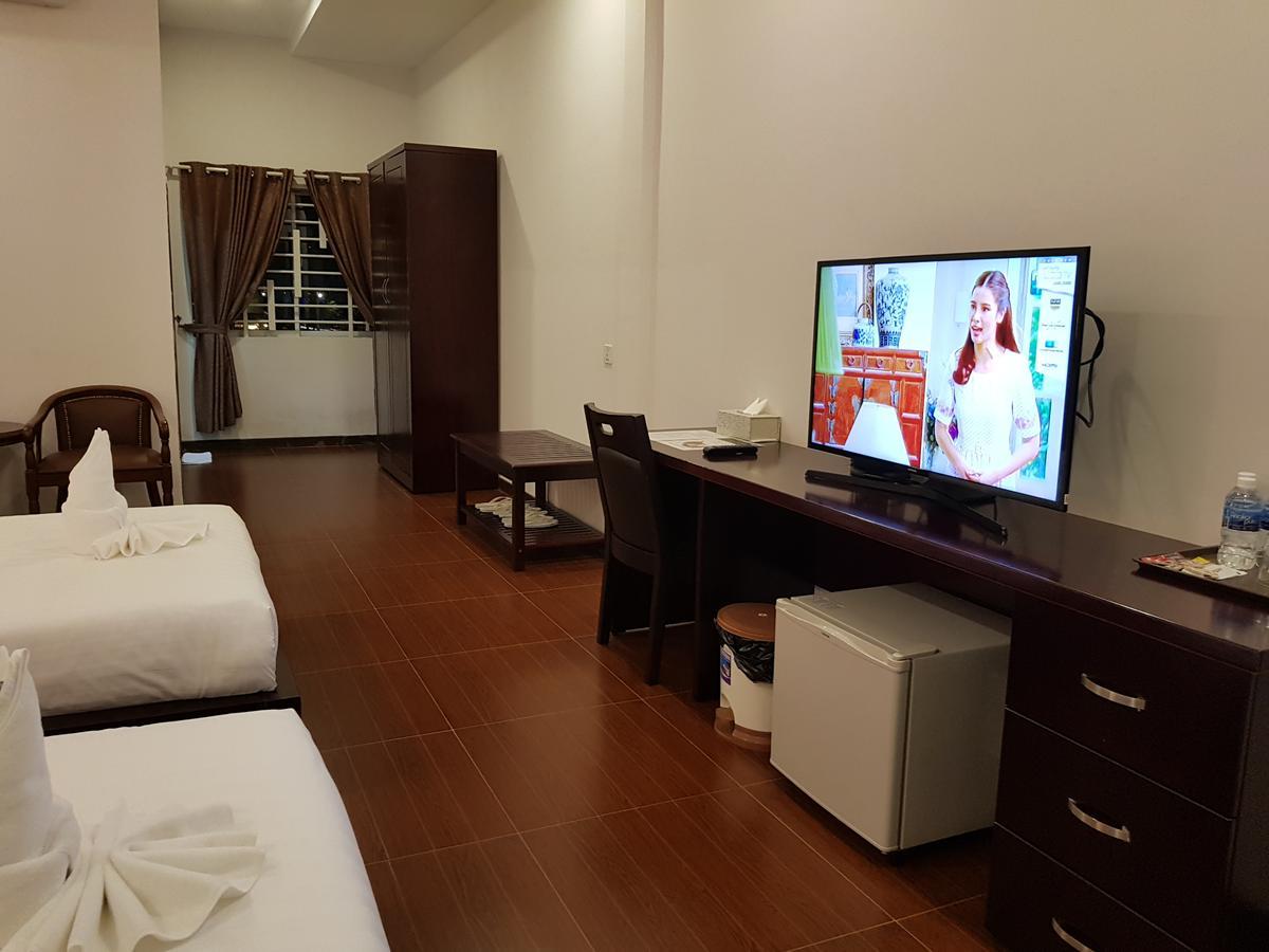 โรงแรมโกลเดน แอปเปิล พนมเปญ ภายนอก รูปภาพ