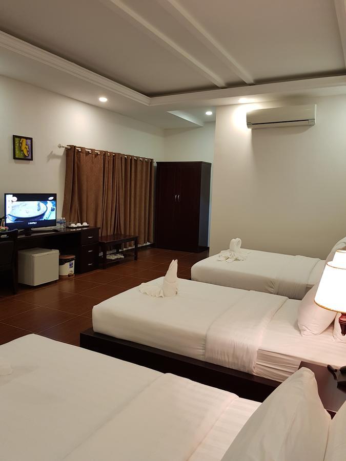 โรงแรมโกลเดน แอปเปิล พนมเปญ ภายนอก รูปภาพ